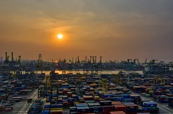 Shipping dock with sunset 