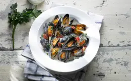 Cider Braised Mussels with Bacon and Crème Fraîche